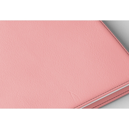 Détail texture simili cuir couverture agenda infirmière rose pastel
